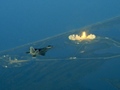 F-22 Raptor flying over air cover - Jet